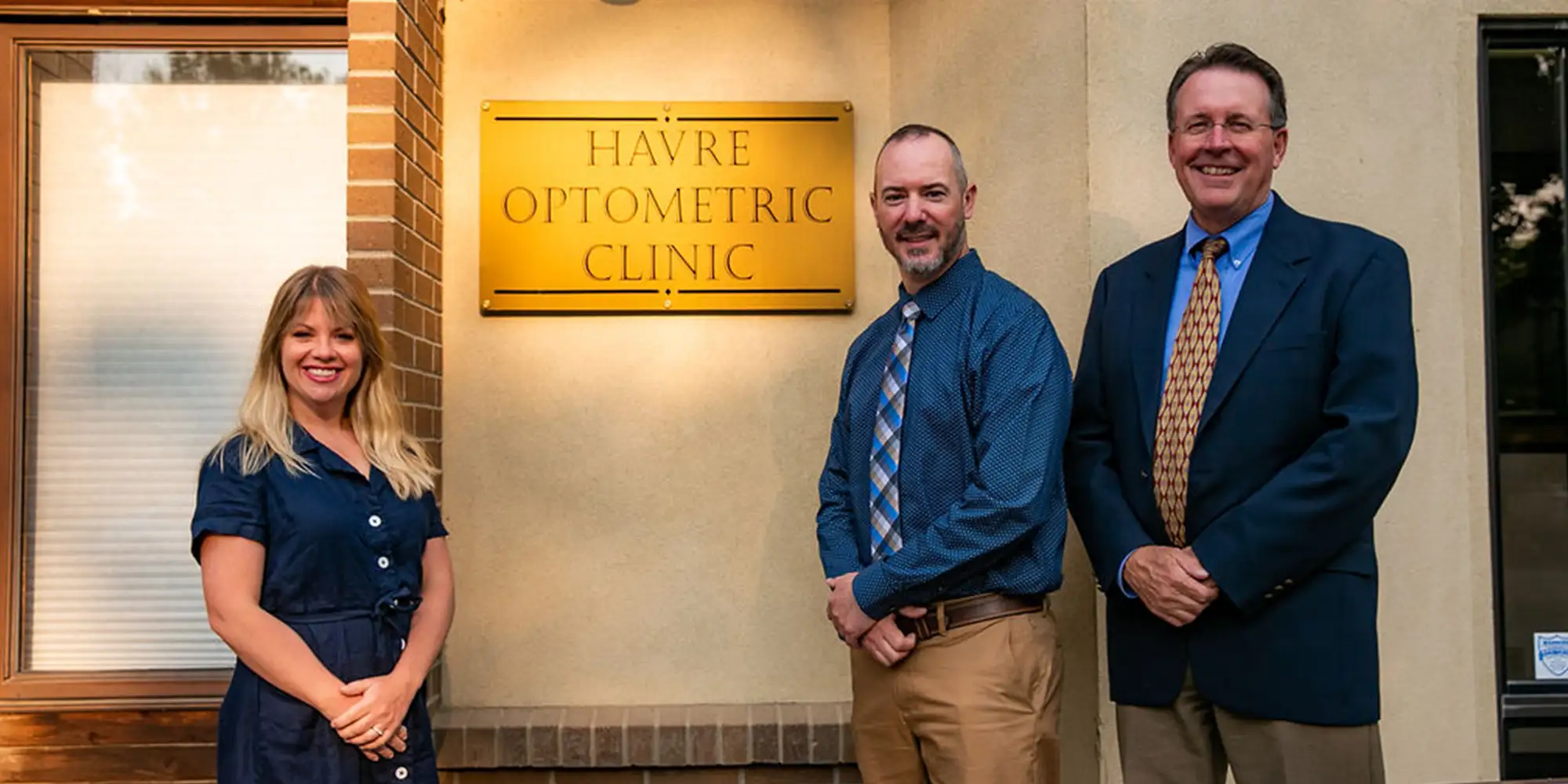 Eye Doctor Havre MT Team In Front Of Sign